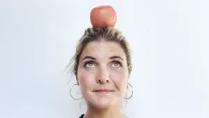 Abbey with an apple perched on top of her head