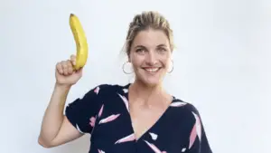 Abbey holding a banana